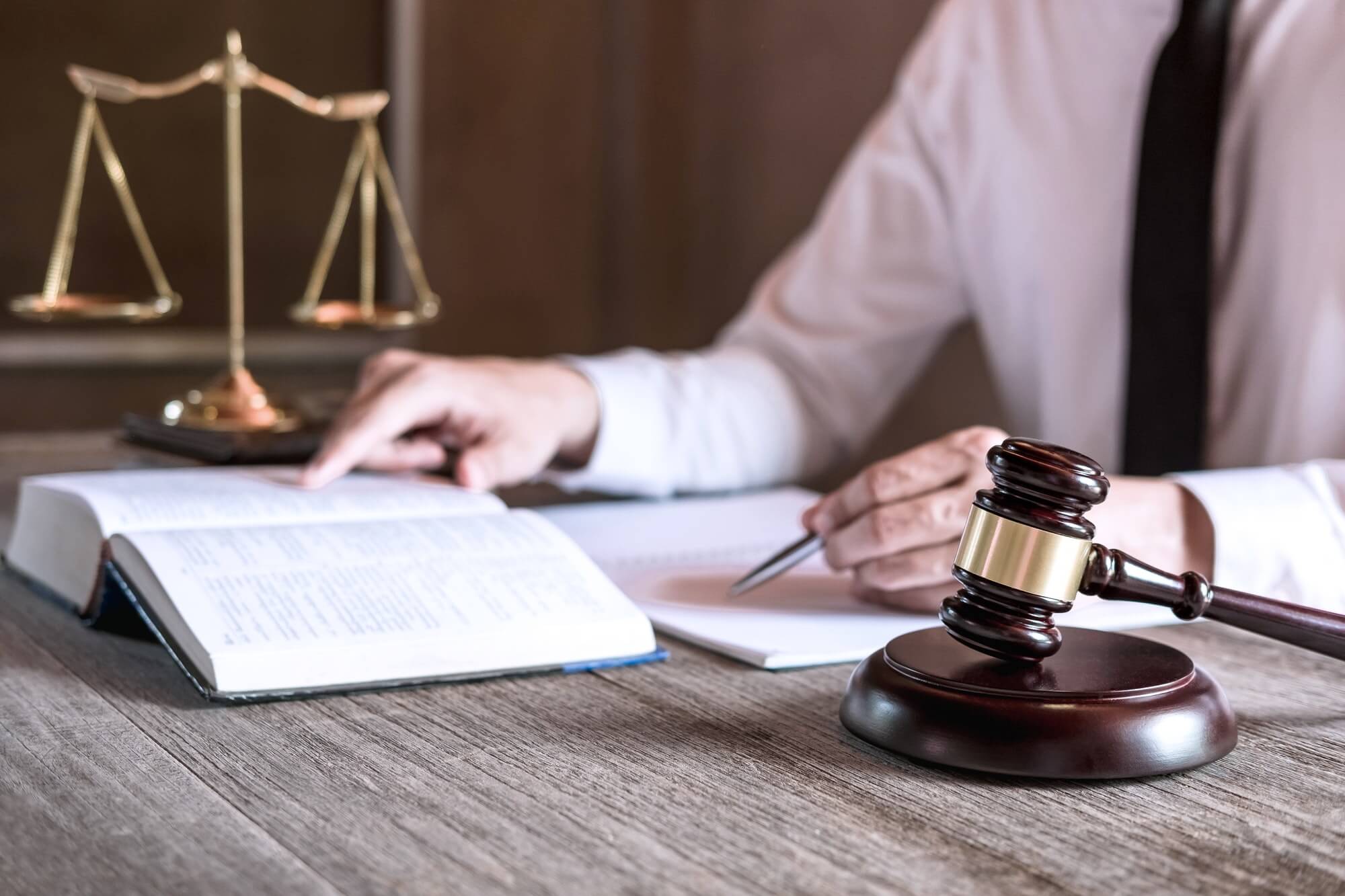 male-lawyer-or-judge-working-with-law-books-1.jpg male-lawyer-or-judge-working-with-law-books-1.jpg